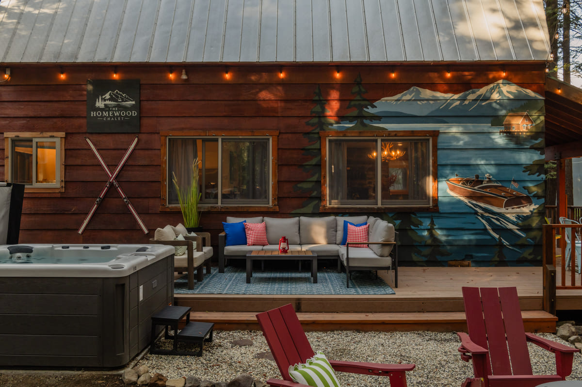 The hot tub and the deck lounge in afternoon light