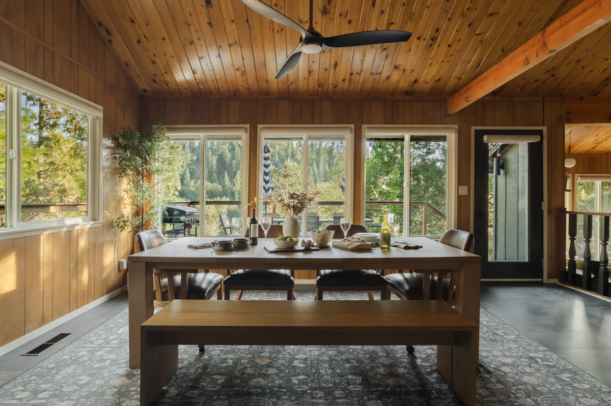 The dining table under the vaulted ceiling